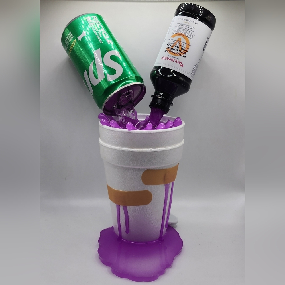 Double cup pouring Sprite/Wockhardt display
